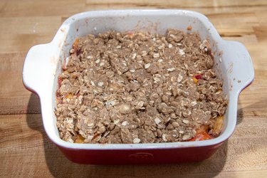 Homemade peach crisp ready for the oven