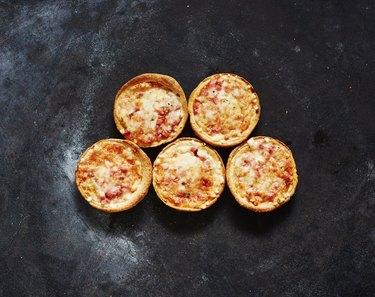 Five mini cheese pizzas