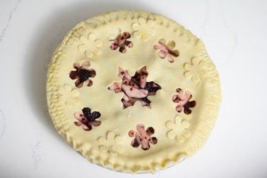 Snowflake shapes cut out of pie crust