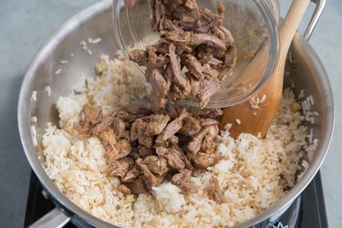 Add pork adobo and two tablespoons adobo sauce