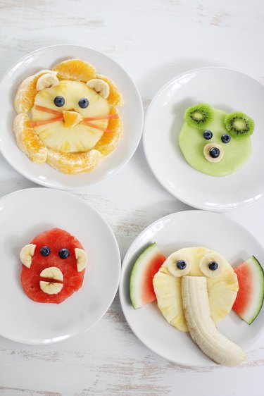 Four plated animal face fruit snacks for kids