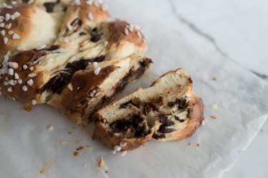 This challah is an incredibly enriched bread that\'s studded with melted chocolate chips.