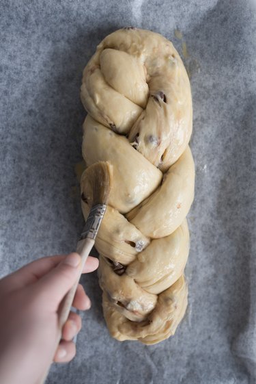 Lightly brush the dough with the egg wash.