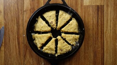 Separated wedges of low-carb, gluten-free maple nut scone dough before baking.