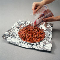 Fill foil-lined tart pan with dried beans when baking a tart.