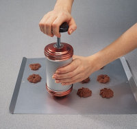 Press the dough on to a cookie sheet.