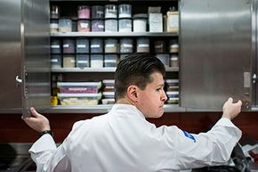 Chef Richard Rosendale opens a cabinet of spices he uses to experiment with recipes in a bunker below the Greenbrier Resort in White Sulphur Springs, West Virginia.