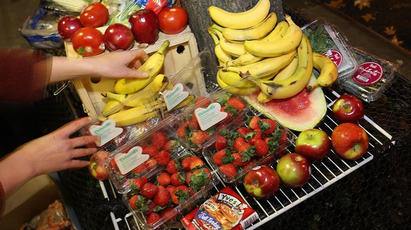 In New York City, perfectly good apples, bananas, strawberries and other food are tossed in the trash with garbage.  DON EMMERT/AFP/Getty Images