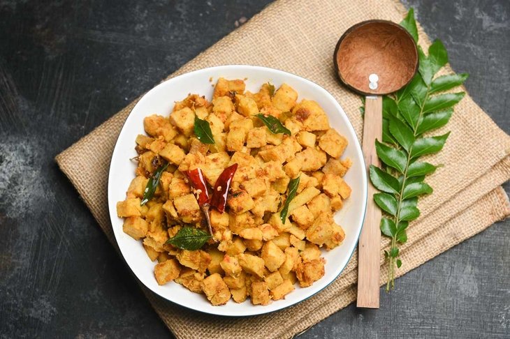 Elephant Yam stir fry or taro roots Stir fried , elephant foot yam curry , Suran or Chena curry Kerala, India. Arbi ki sabji , Indian Sabji or vegetable stir fry Masala recipe for rice, Chapati.